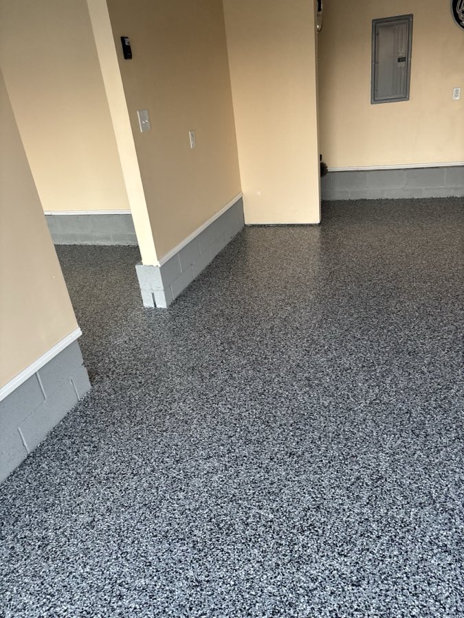 Flake floor running back to the garage door opening